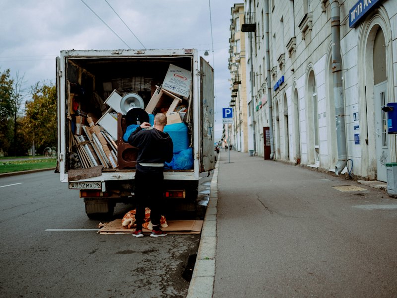 Mover unloading furniture from a truck