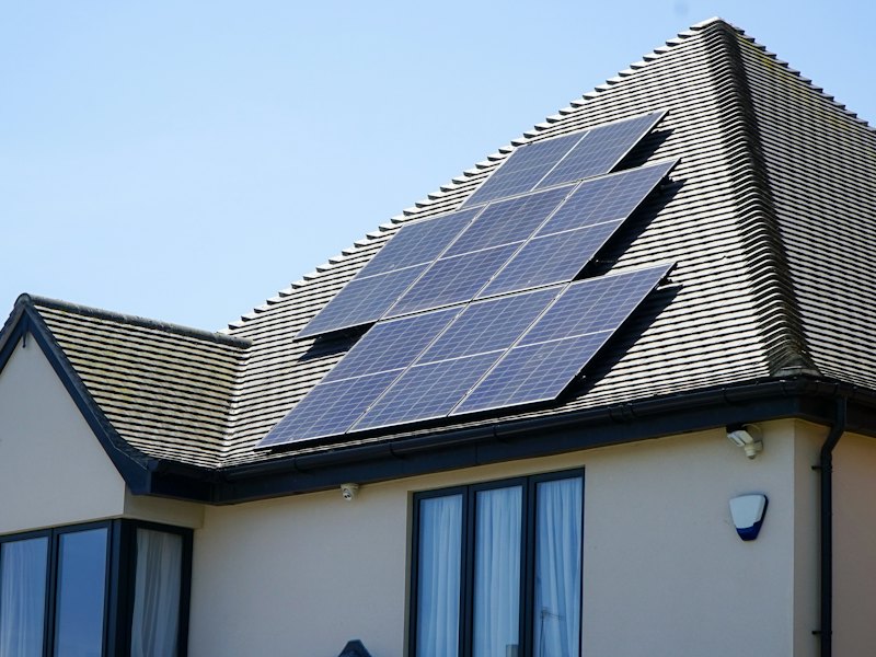 Home with rooftop solar panels