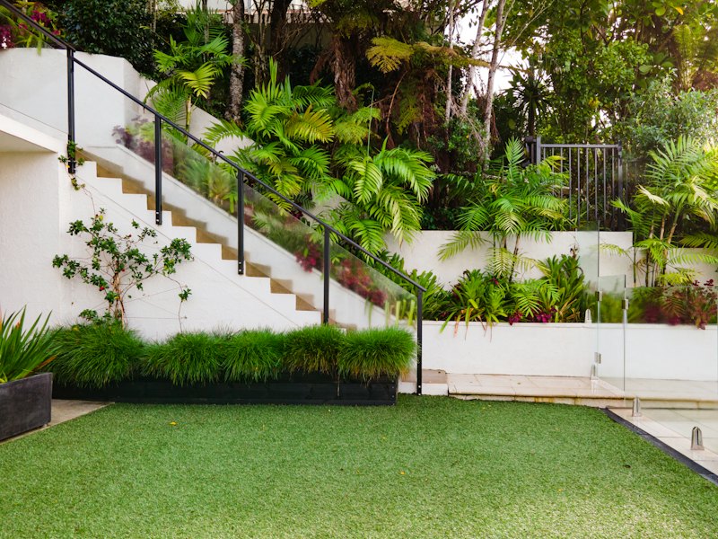 Home with a green front lawn